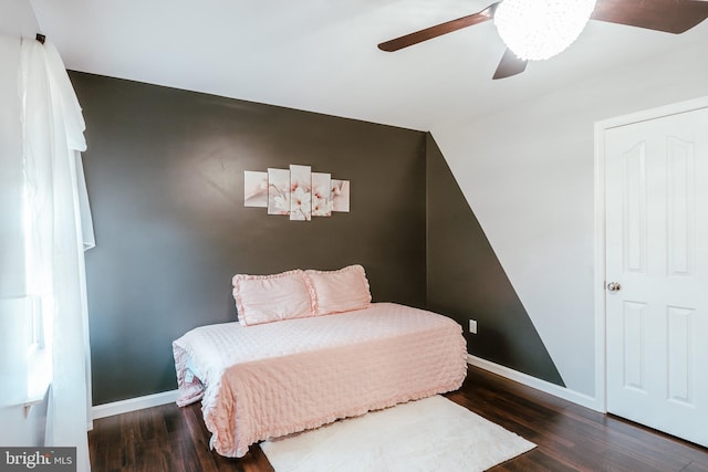 bedroom featuring dark wood-type flooring and ceiling fan