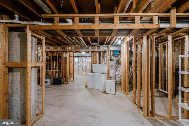 basement featuring gas water heater