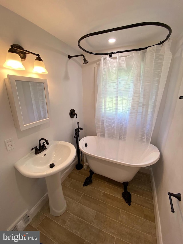 bathroom with a bathing tub