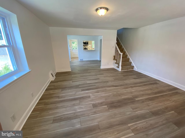 interior space with dark hardwood / wood-style floors