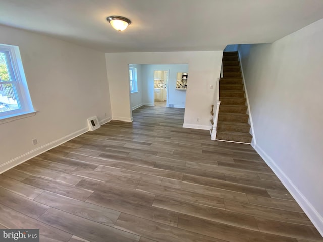 interior space with dark hardwood / wood-style flooring