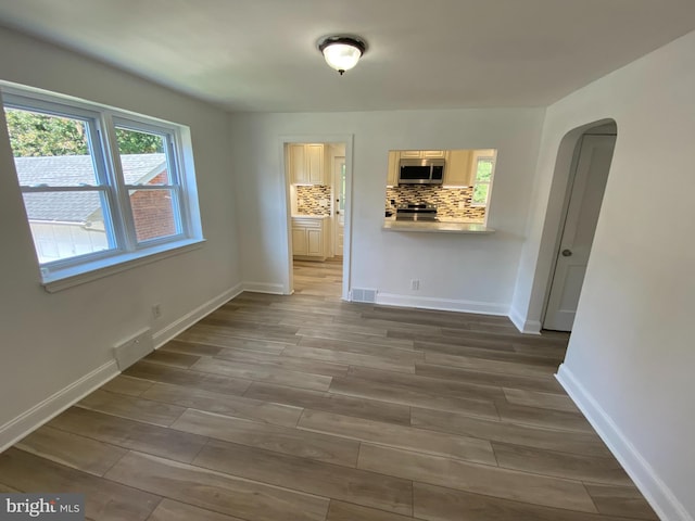 interior space with hardwood / wood-style floors