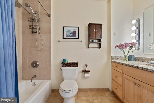 full bathroom featuring vanity, shower / tub combo, toilet, and tile patterned floors