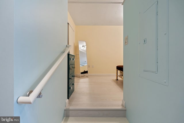 stairs with wood-type flooring