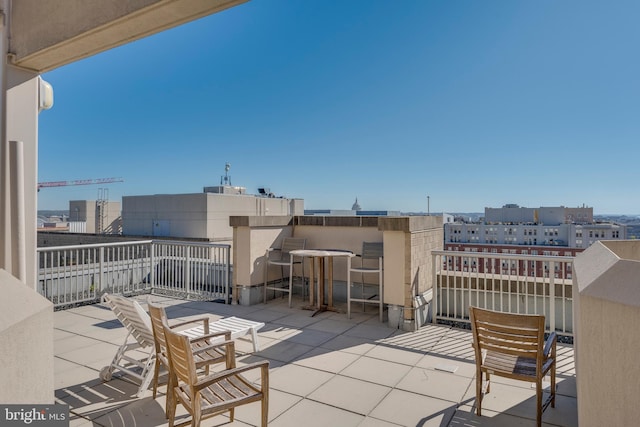 view of patio with a balcony