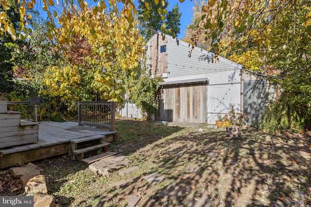 view of yard with a wooden deck