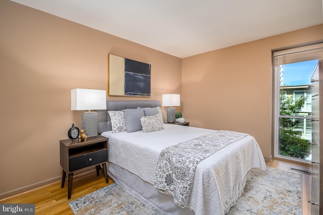 bedroom featuring light wood-type flooring