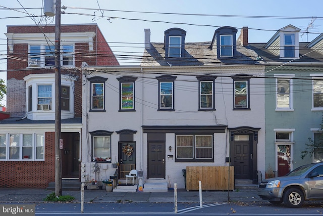 view of property with cooling unit