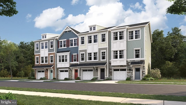 6834 Winterhill Ln, Glen Burnie, MD 21060 - townhome / multi-family property featuring an attached garage, driveway, and stone siding