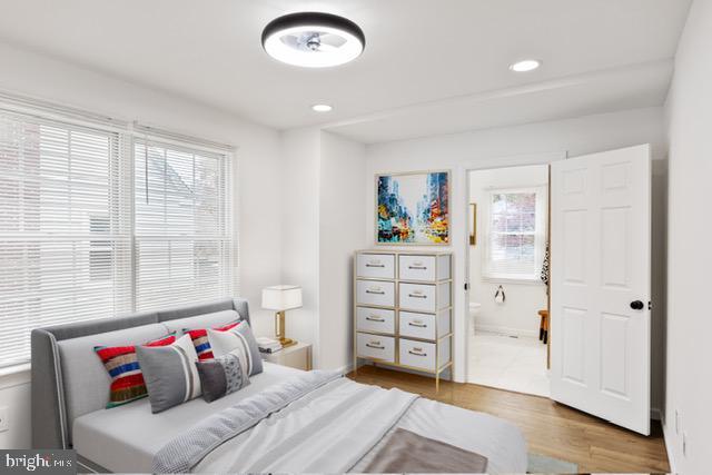 119 E Camden Ave, Moorestown, NJ 08057 - bedroom with wood finished floors, recessed lighting, and ensuite bathroom