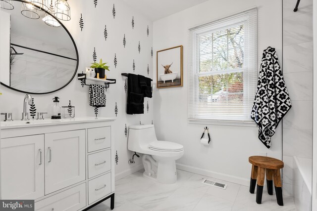 119 E Camden Ave, Moorestown, NJ 08057 - bathroom featuring baseboards, toilet, marble look tiles, vanity, and a chandelier
