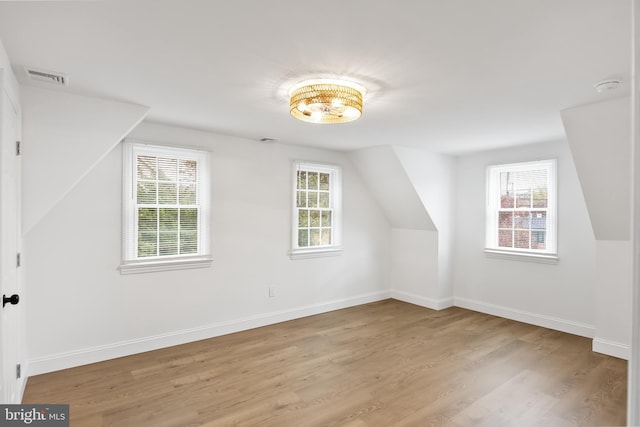 119 E Camden Ave, Moorestown, NJ 08057 - bonus room with wood finished floors, baseboards, and lofted ceiling