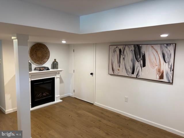 119 E Camden Ave, Moorestown, NJ 08057 - unfurnished living room featuring wood finished floors, a fireplace with raised hearth, baseboards, and recessed lighting