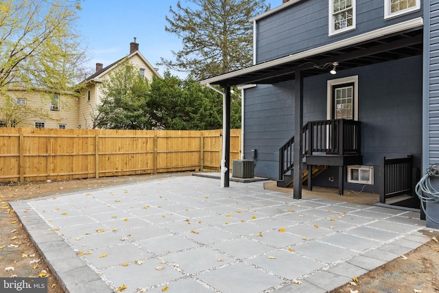 view of patio featuring central AC unit