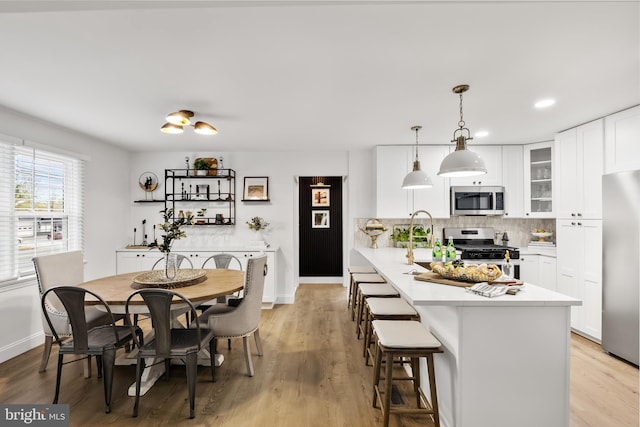 119 E Camden Ave, Moorestown, NJ 08057 - dining area featuring baseboards, light wood-style floors, and recessed lighting
