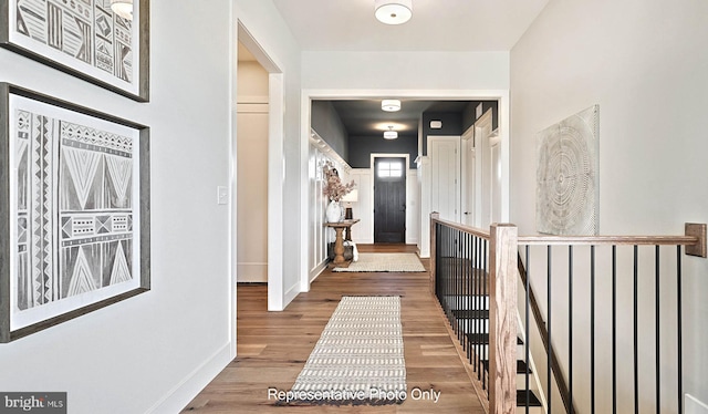 hallway featuring hardwood / wood-style flooring