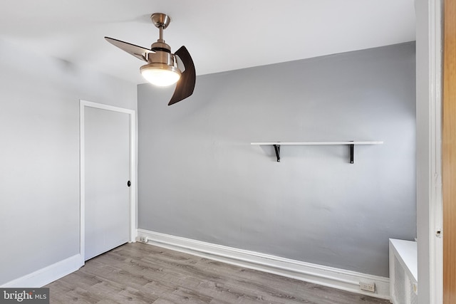 spare room with light hardwood / wood-style floors and ceiling fan