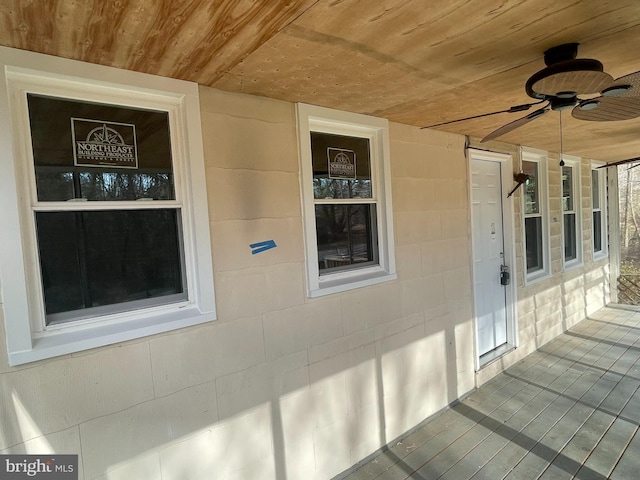 exterior space featuring covered porch and ceiling fan
