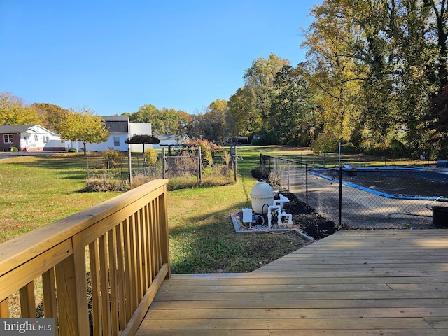 wooden terrace with a yard