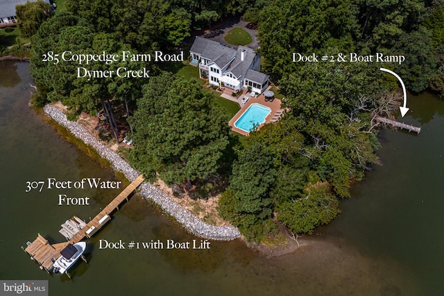 birds eye view of property featuring a water view