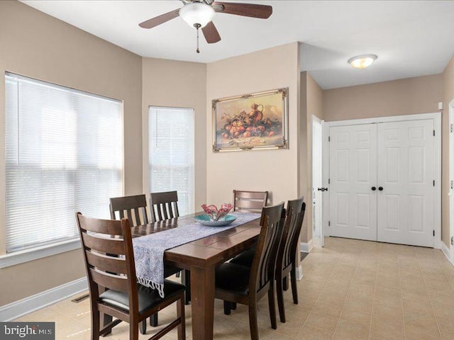 dining room with ceiling fan