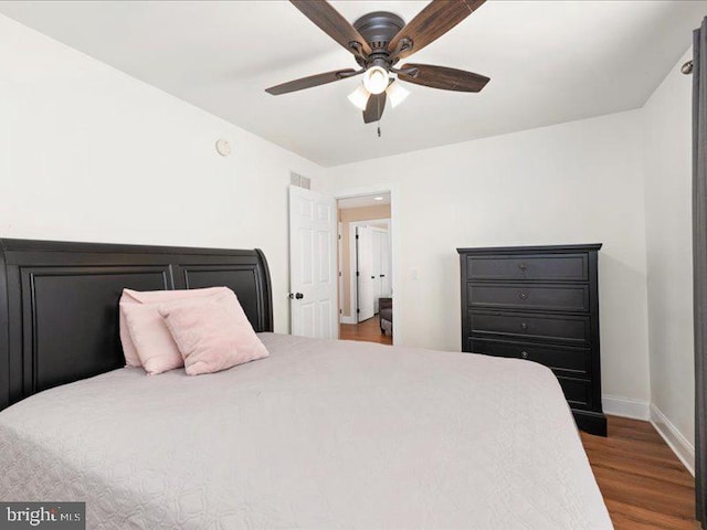 bedroom featuring wood-type flooring and ceiling fan