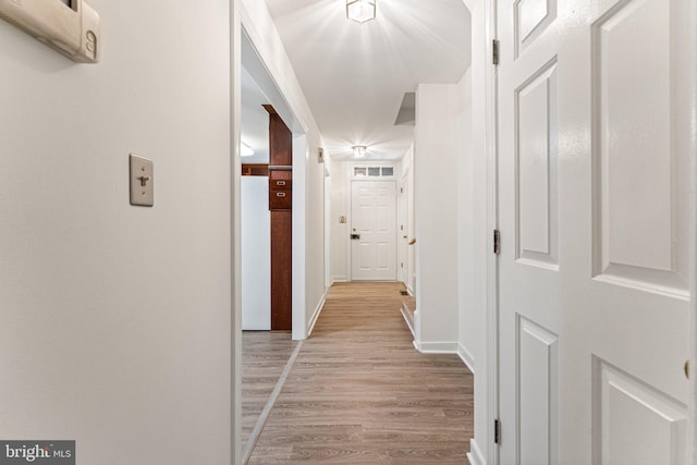 hall featuring light wood-type flooring