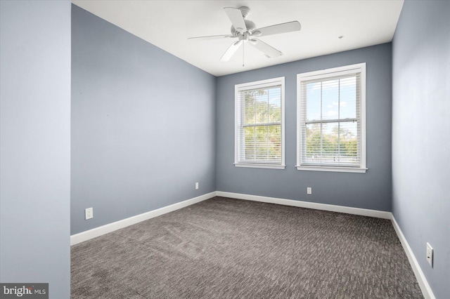 empty room featuring carpet and ceiling fan