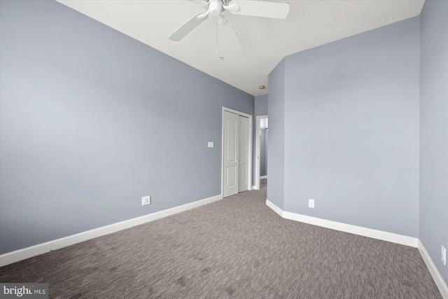 unfurnished room featuring ceiling fan, carpet, and vaulted ceiling