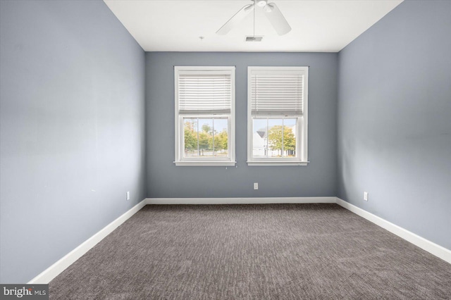 carpeted empty room with ceiling fan