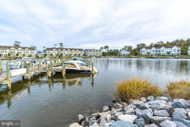 view of dock with a water view