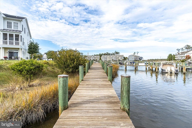 dock area featuring a water view