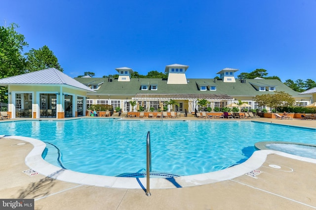 view of pool featuring a patio