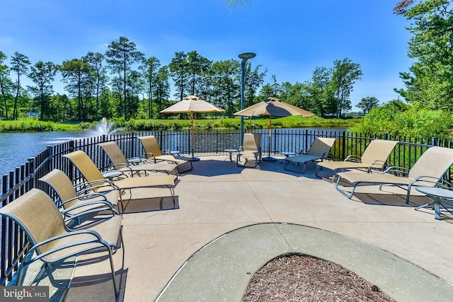 view of patio / terrace featuring a water view