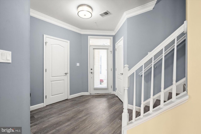 entryway featuring crown molding and dark hardwood / wood-style flooring