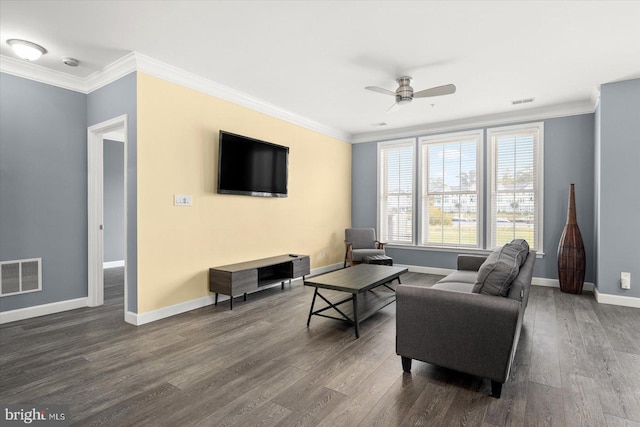 living room featuring crown molding, ceiling fan, and dark hardwood / wood-style flooring