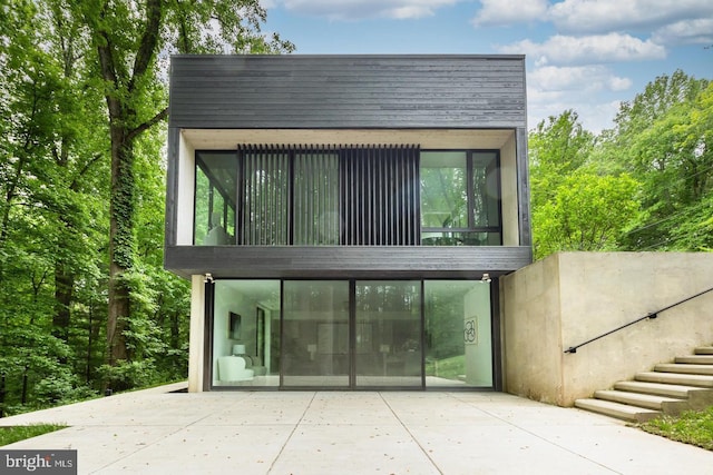 back of house featuring a patio area