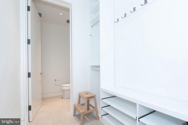 walk in closet featuring light tile patterned floors