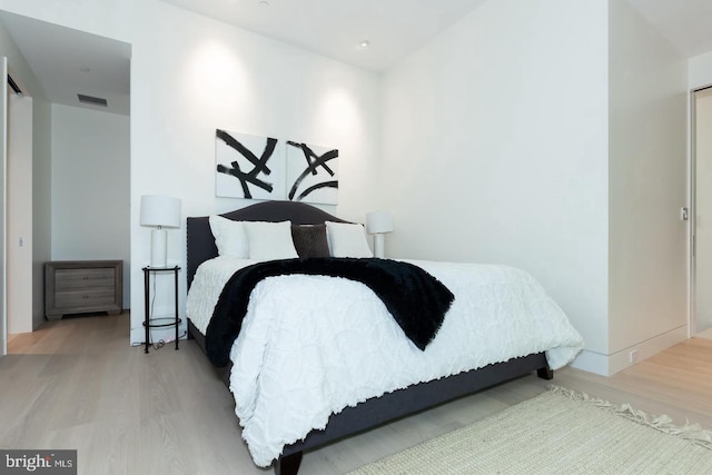 bedroom featuring hardwood / wood-style flooring