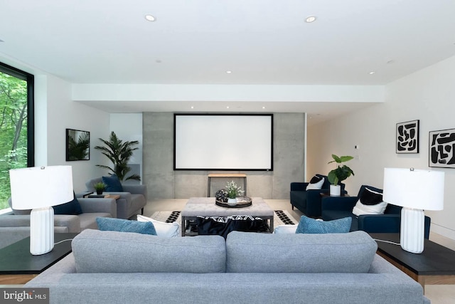 home theater room featuring recessed lighting and wood finished floors