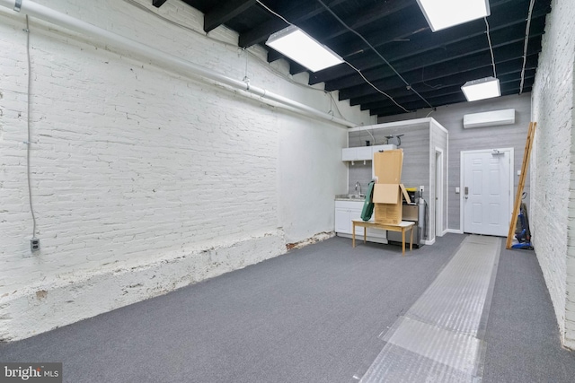 interior space featuring sink and a wall mounted AC