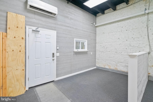 doorway to property with a wall mounted air conditioner