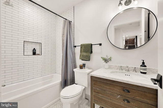 full bathroom featuring shower / bath combo with shower curtain, toilet, tile patterned flooring, and vanity