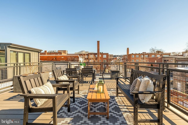 view of patio featuring a balcony