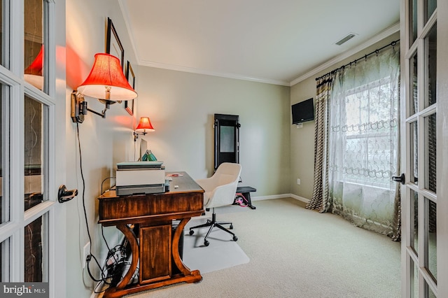 carpeted home office with ornamental molding and french doors