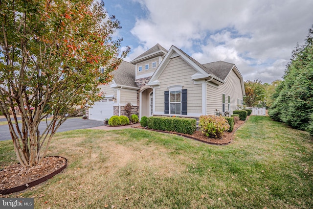 view of front of home with a front yard