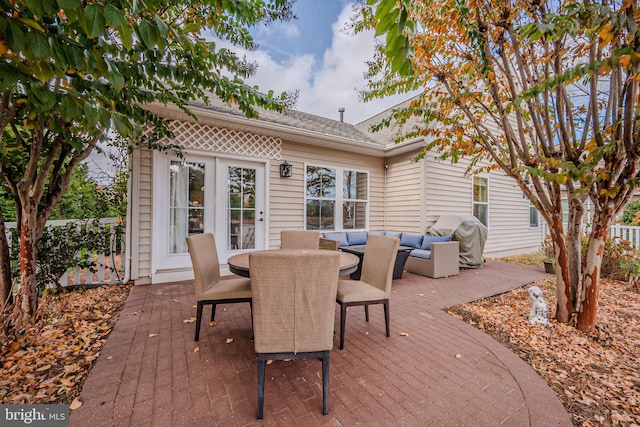 deck featuring a patio and an outdoor living space