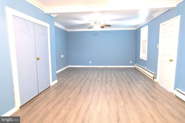 unfurnished bedroom with light wood-type flooring, ornamental molding, baseboard heating, and ceiling fan