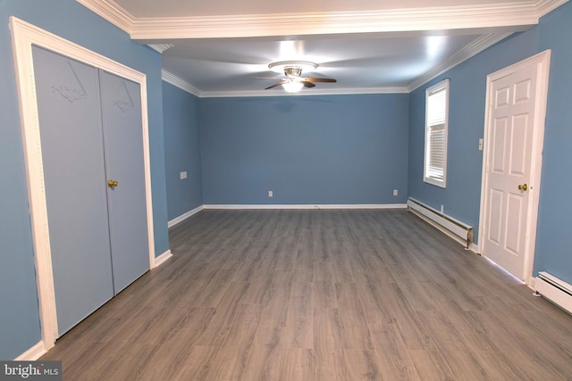 unfurnished bedroom featuring a baseboard radiator, crown molding, and dark hardwood / wood-style floors