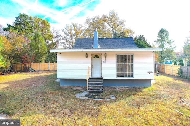 2810 Panther Rd, Vineland, NJ 08361 - bungalow-style house with a fenced backyard, entry steps, a shingled roof, and a front lawn